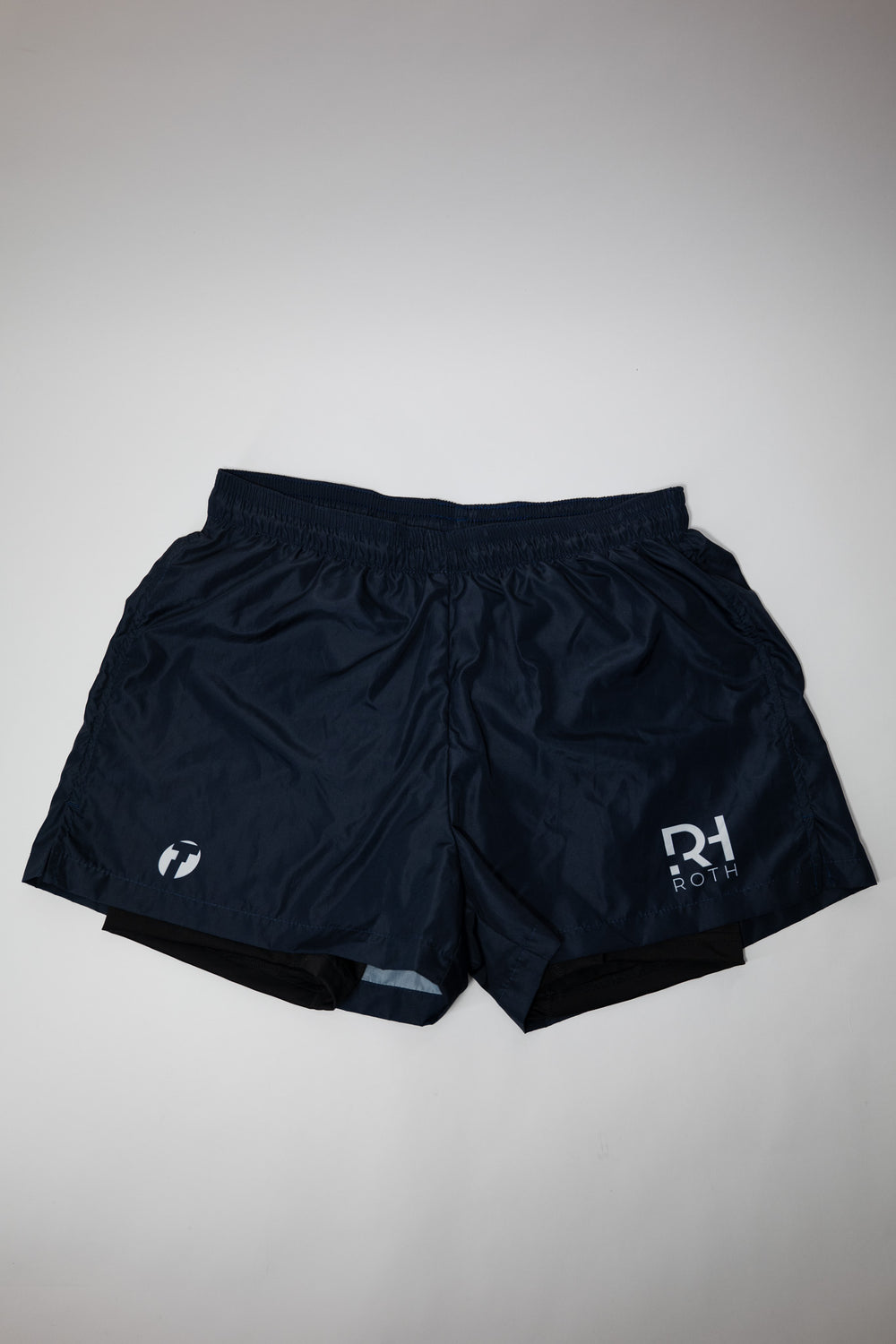 Running Shorts Fast in dunkel blau von Trimtex mit weißem RH-Tri und Trimtex Logo